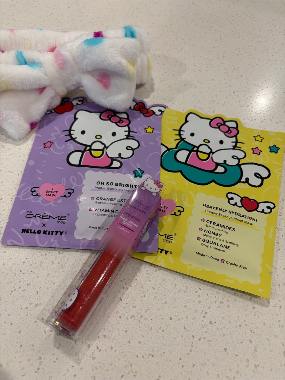 the CREME shop Hello Kitty x tSheet Masks & Lip Gloss Red Pink NWT Spa Headband